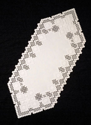 Table Runner, Norwegian cutwork embroidery, 2007; Aline Drivdahl (b. 1947); Fairhaven, Massacusetts; Cotton and thread; 37 x 16 in. ; Private Collection; Photography by Jason Dowdle