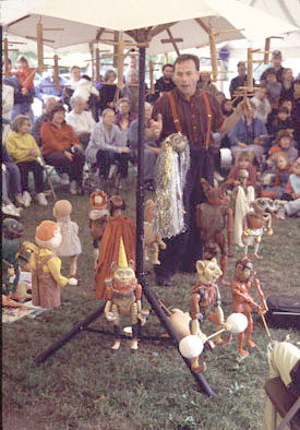 Puppeteer Dusan Petran demonstrating his puppets' abilities, Ethnic festival, 2001; Eastern European Festival; Deerfield, Massachusetts; Photography by Kate Kruckemeyer