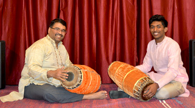 Mahalingam Santhanakrishnan playing mridangam, Carnatic mridangam, 2018; Lexington, Massachusetts; Photography by Maggie Holtzberg