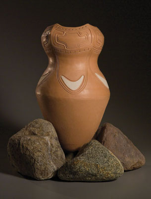 In Wetu, Cooking Pot, Wampanoag pottery, 2001; Ramona Louise Peters (b. 1952); Mashpee, Massachusetts; Clay, composite; Pot: 17 x 9 1/4 in. diam. Assembled on rocks: 19 x 16 x 16 in.; Collection of the artist; Photography by Jason Dowdle