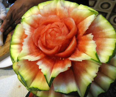 Carved watermelon by Ruben Arroco, Carved fruit, 2013; Ruben Arroco; Lowell, Massachusetts; Photography by Maggie Holtzberg