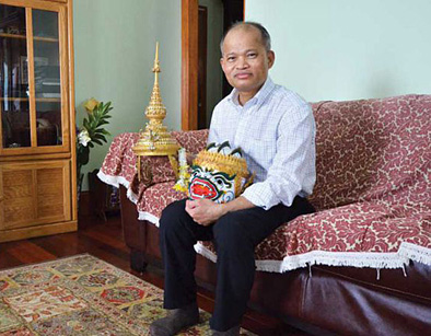 Tim Thou Chan at home. Photo: Brent Crane, Cambodian folk dance, 2018; Lowell, Massachusetts;