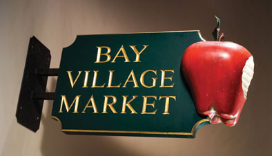 Bay Village Market, Hand carved sign, 1993; Gneal Widett (b. 1946); Boston, Massachusetts; Wood, paint, gold leaf; 25 3/4 x 51 x 17 1/2 in.; Private Collection; Photography by Jason Dowdle