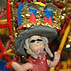 Miniature Robyn on Robyn Clayton's hat; St. Peter's Fiesta Hats; 2012: Gloucester, Massachusetts