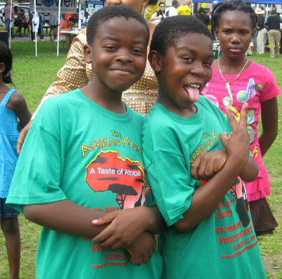 Young boys in African Festival t-shirts; Ethnic festival; 2009: Lowell, Massachusetts