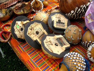 Woman selling African fabrics; Ethnic festival; 2009: Lowell, Masachusetts